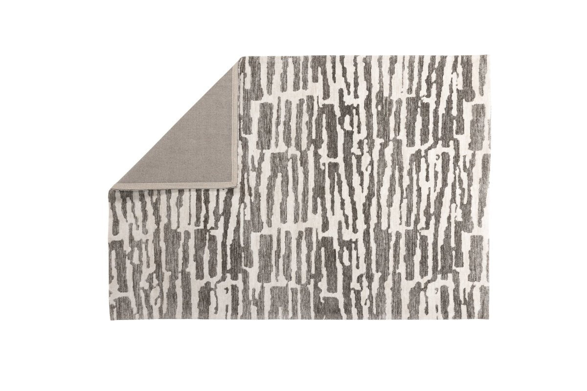 Teppich Inara – in Beige oder Grau aus Polyester & Baumwolle