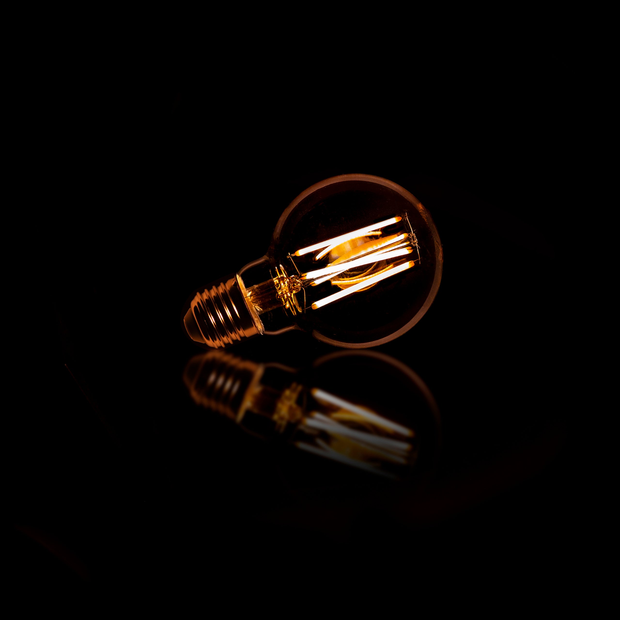 LED-Glühlampe Calyra – G70-E27 mit amberfarbenem Glas