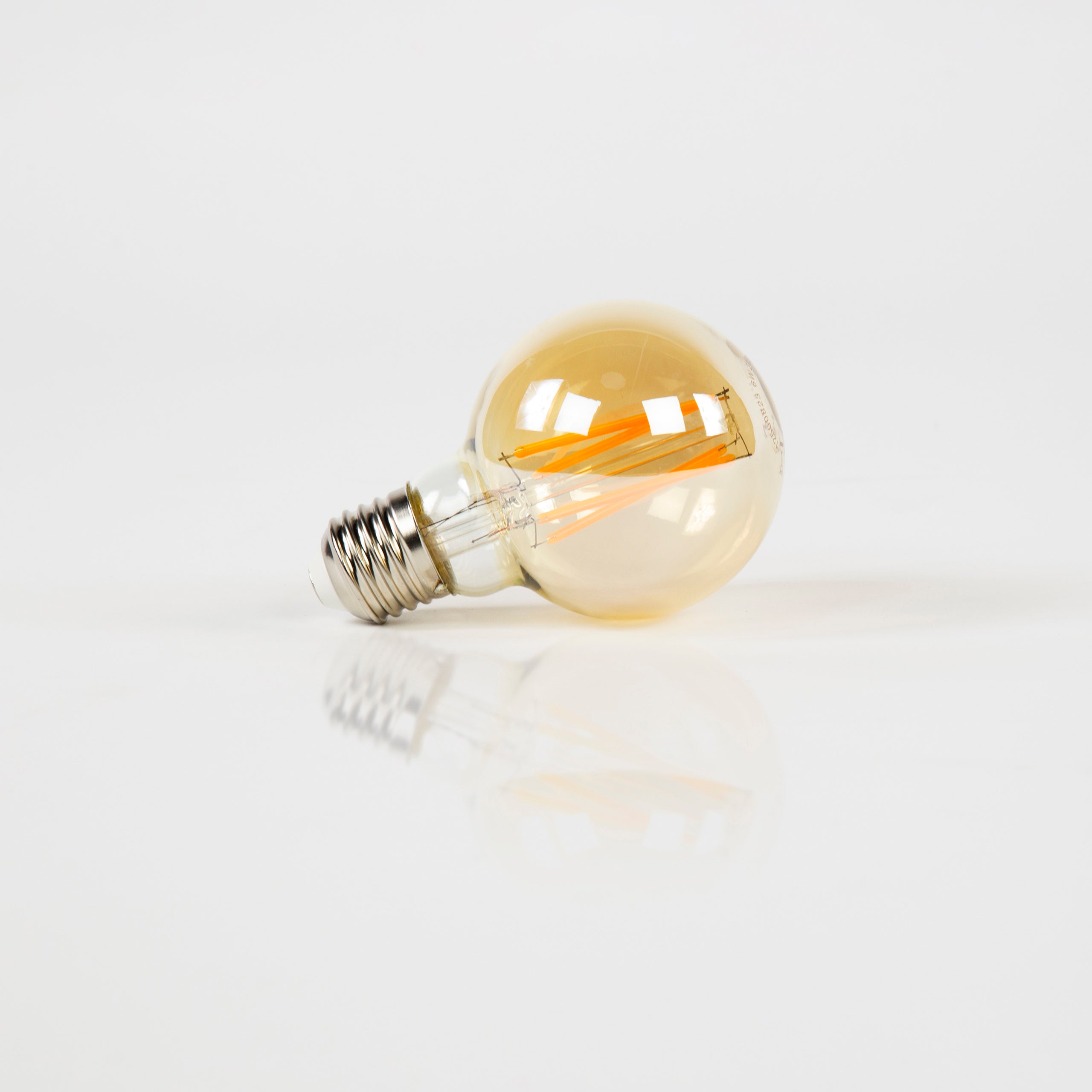 LED-Glühlampe Calyra – G70-E27 mit amberfarbenem Glas