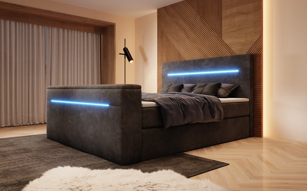 Boxspringbett Sejour mit TV Lift, RGB und Stauraum in Cord