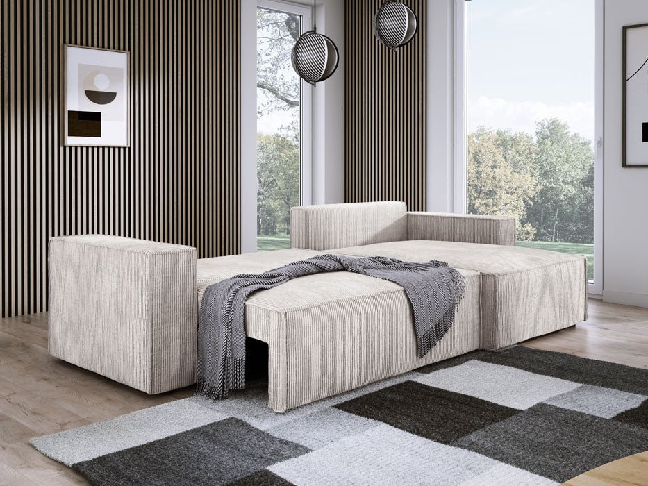 Designer Velanova sofa with sleeper function and storage space, made of corduroy