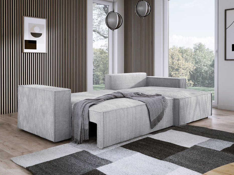 Designer Velanova sofa with sleeper function and storage space, made of corduroy