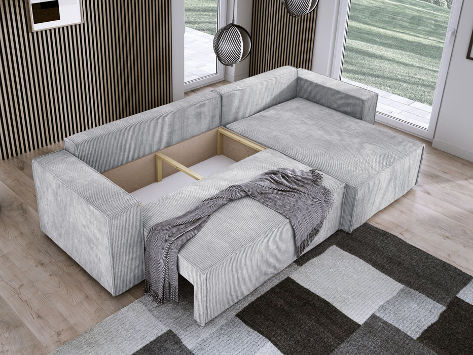 Designer Velanova sofa with sleeper function and storage space, made of corduroy
