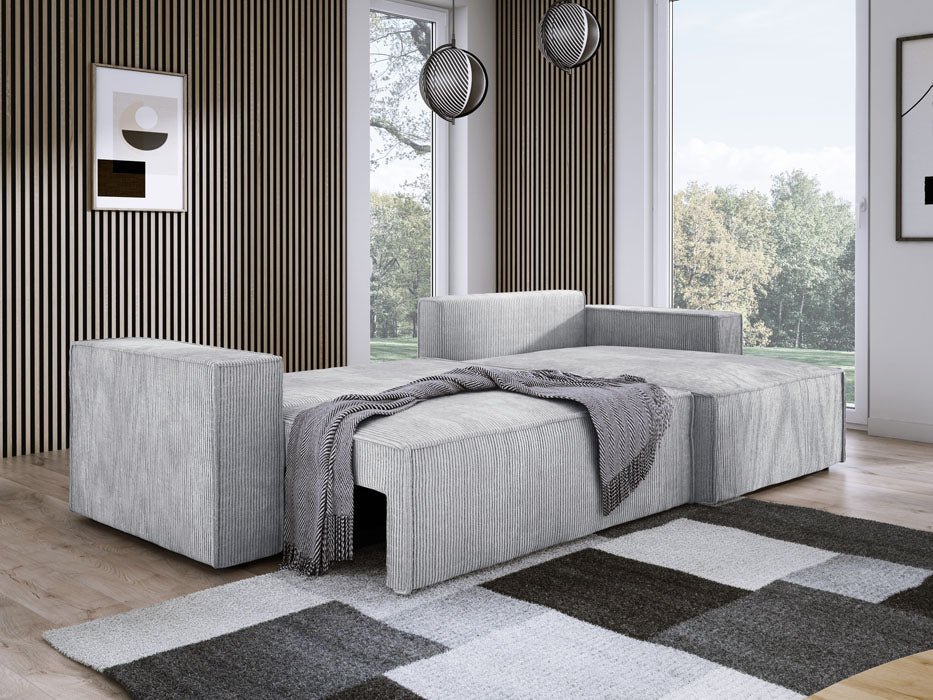 Designer Velanova sofa with sleeper function and storage space, made of corduroy
