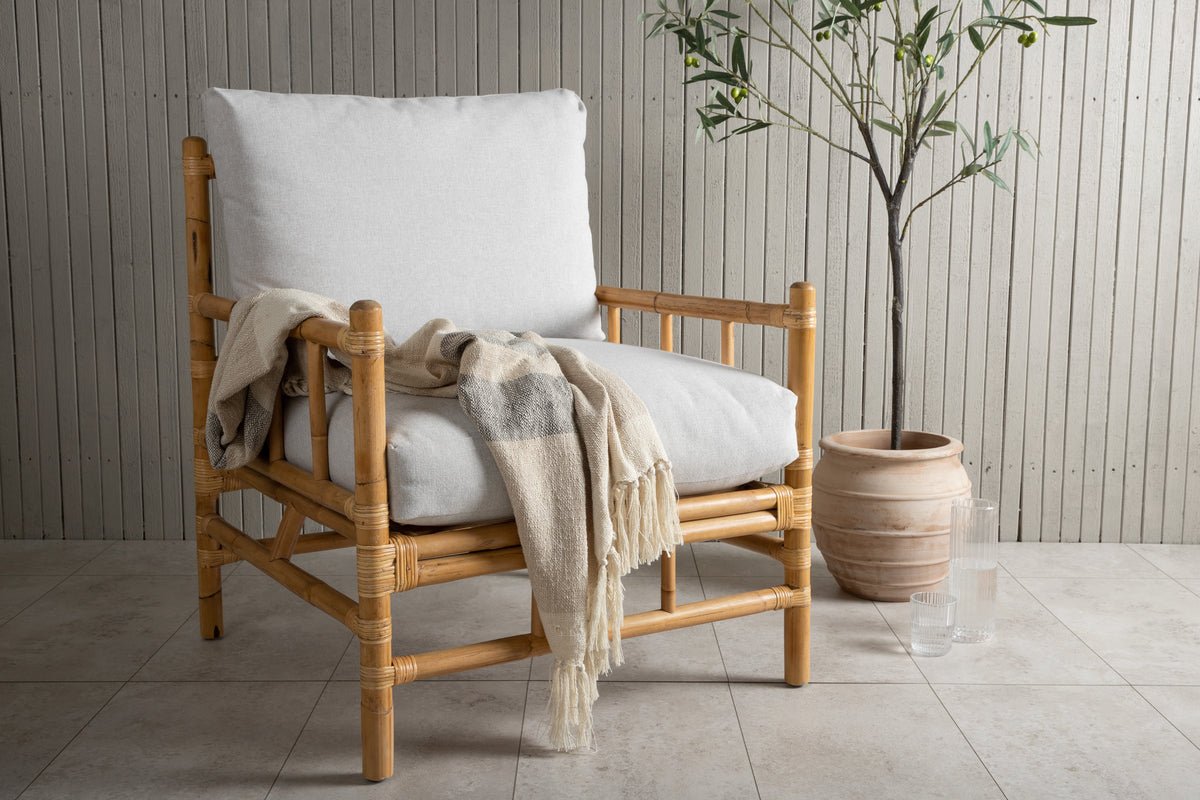 Armchair Bamboo - made of bamboo and rattan with light gray upholstery