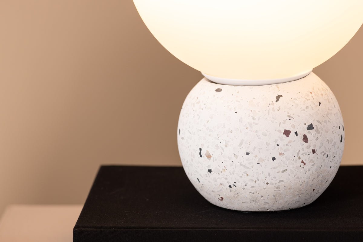 Table lamp "Bregenz" – base made of white terrazzo with dark accents