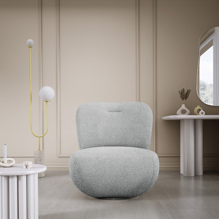 Designer armchair Kyoto 360° swivel function in bouclé
