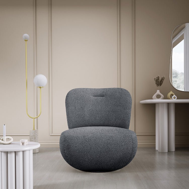 Designer armchair Kyoto 360° swivel function in bouclé