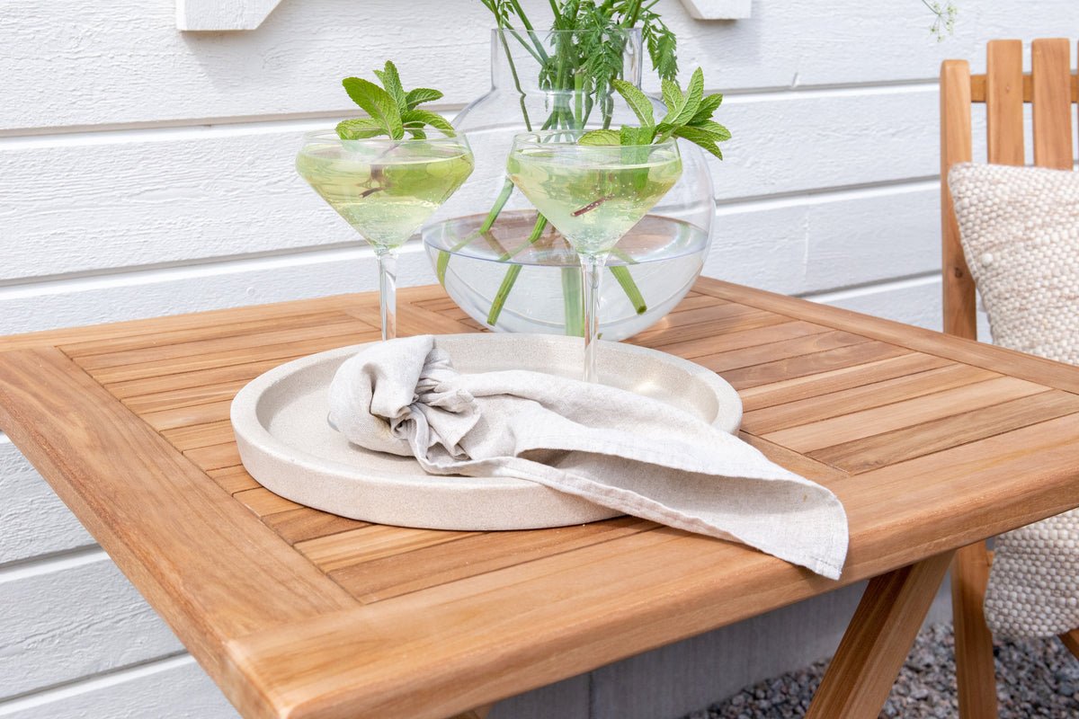 Garden table Siana - a square dining table made of teak wood