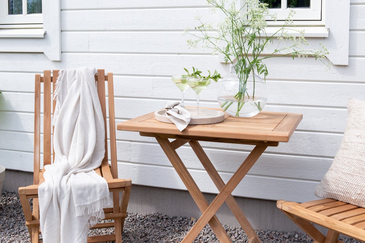 Garden table Siana - a square dining table made of teak wood