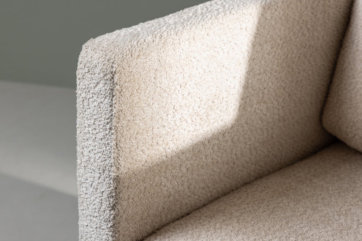 Armchair Rimini - with white bouclé fabric
