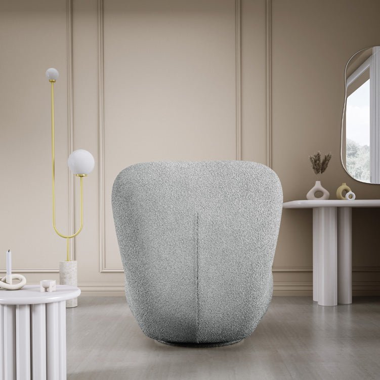Designer armchair Kyoto 360° swivel function in bouclé