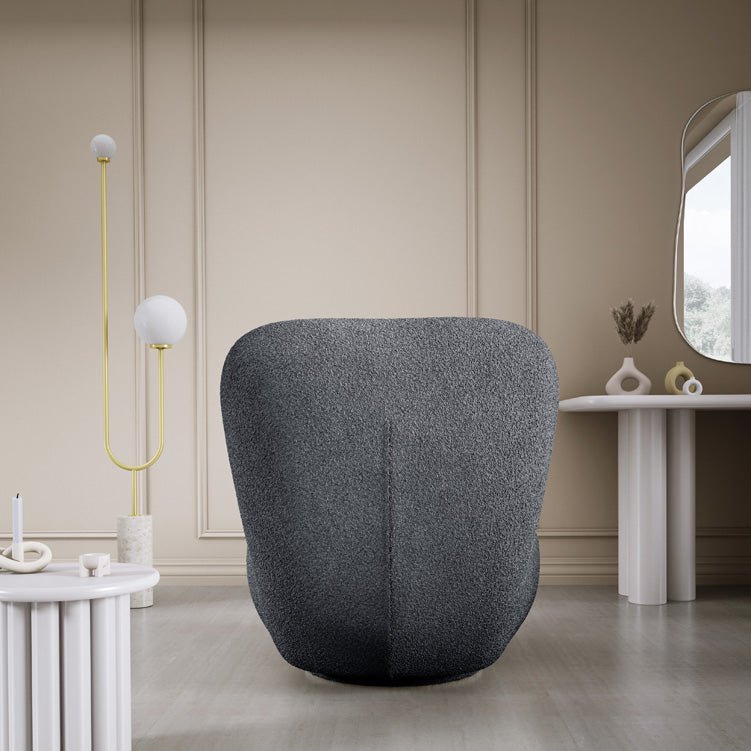 Designer armchair Kyoto 360° swivel function in bouclé