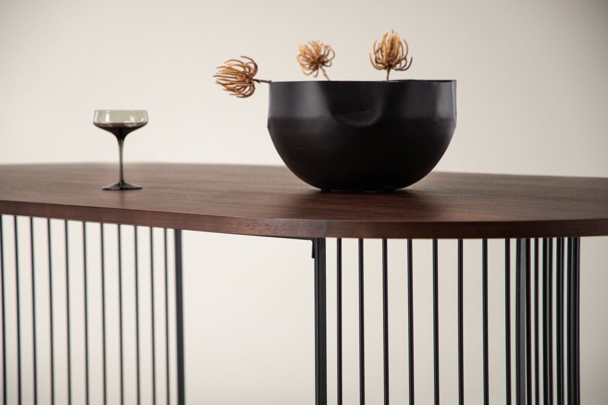Manolo dining table - oval dining table with Black tabletop and walnut