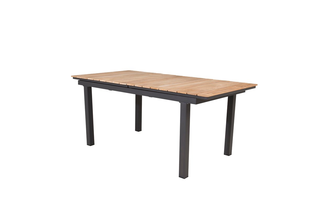 Garden table Caimana - an extendable dining table with a noble teak wood top