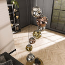 Pendant light Elaris – 7 staggered lights in the metal color combination Gold,Copper and Chrome