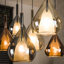 Pendant light "Lumora - 7 drop-shaped glass shades in amber, copper and chrome
