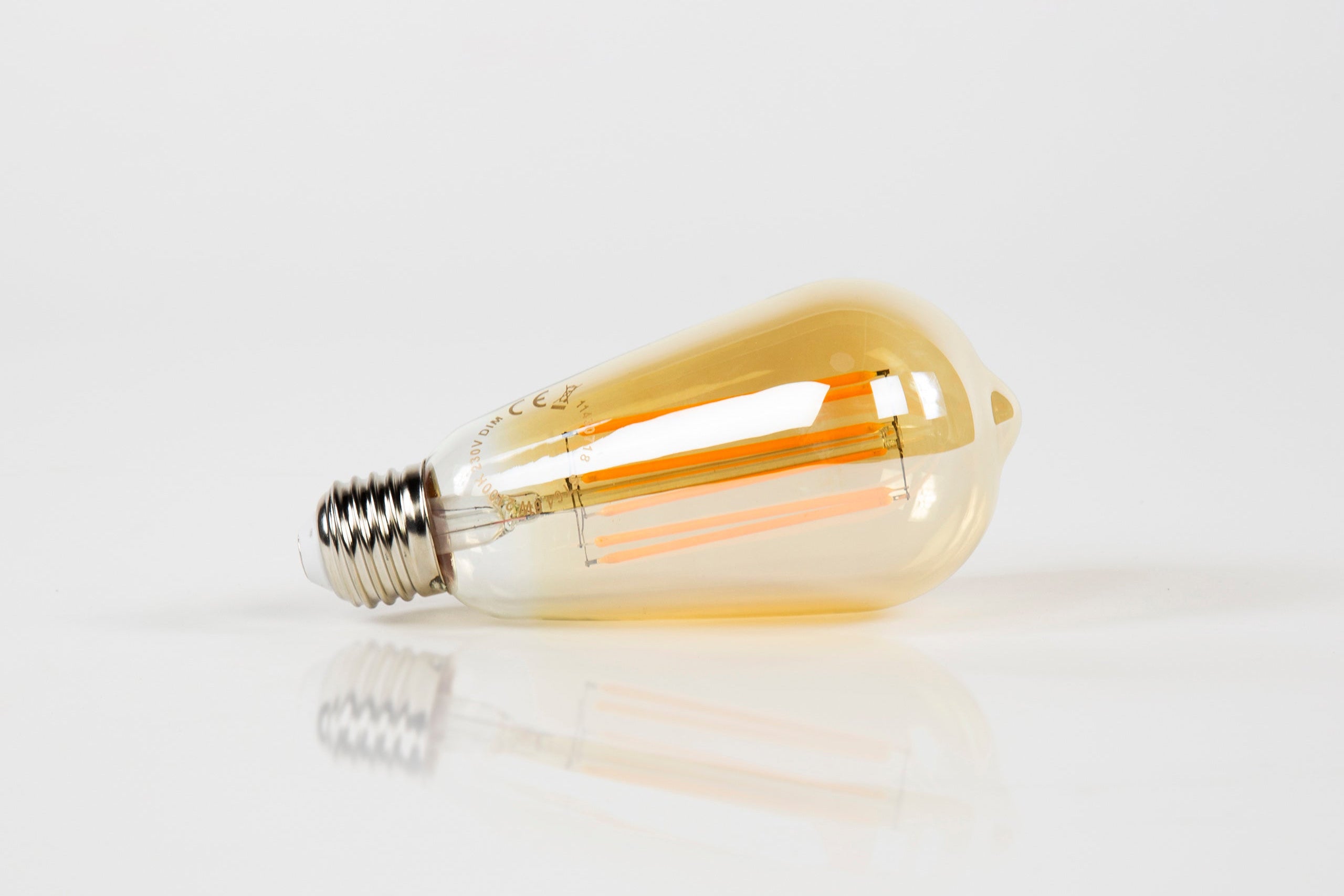 LED light bulb Aura Drop – ST64-E27 with amber-colored glass