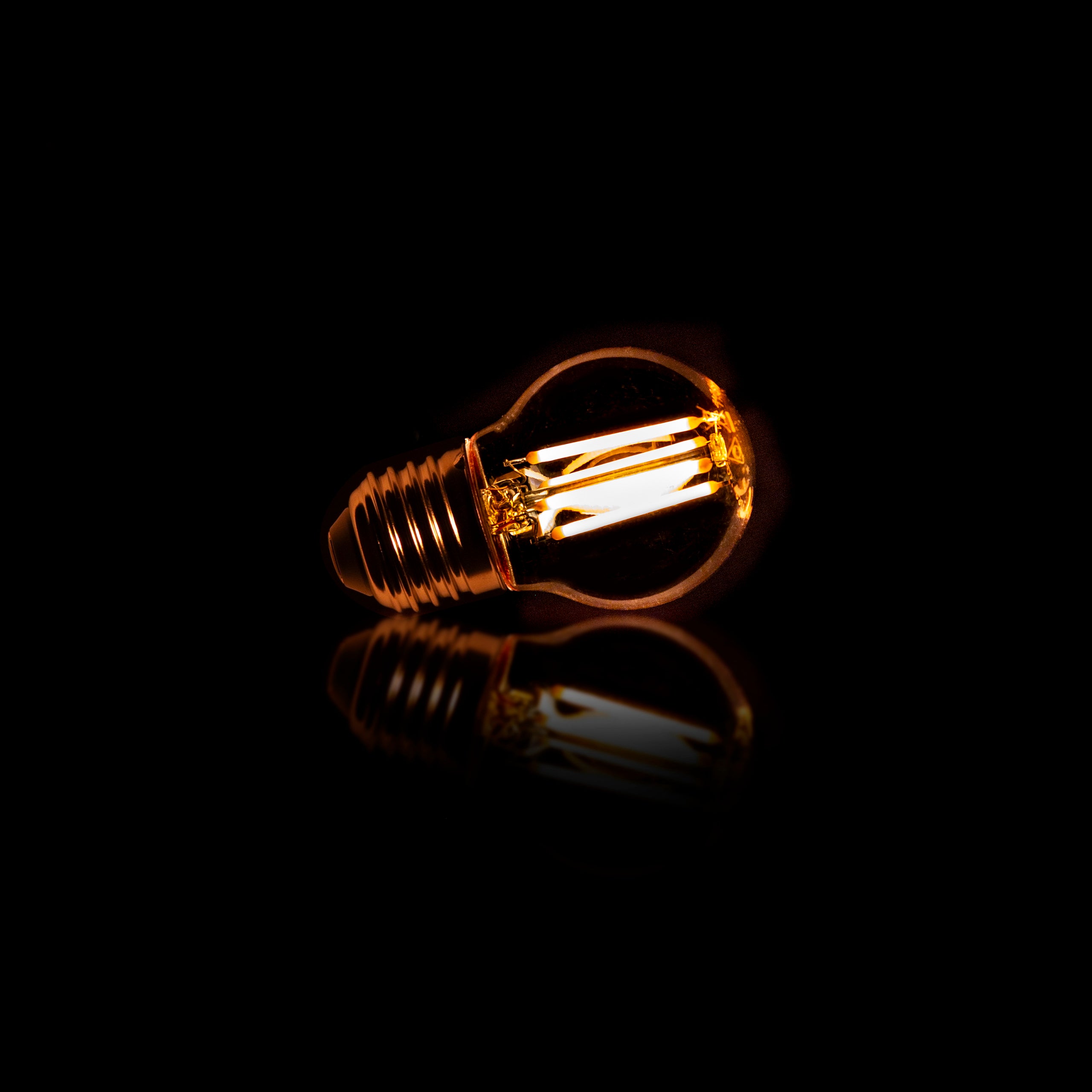 LED incandescent bulb Embera – G45-E27 with amber-colored glass