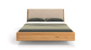 Designer wooden bed Cassian made of solid oak in a floating appearance