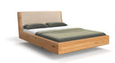 Designer wooden bed Cassian made of solid oak in a floating appearance