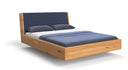 Designer wooden bed Cassian made of solid oak in a floating appearance