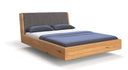 Designer wooden bed Cassian made of solid oak in a floating appearance