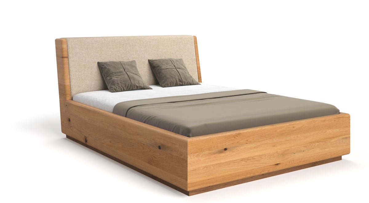 Designer wooden bed Cassian made of solid oak with storage space
