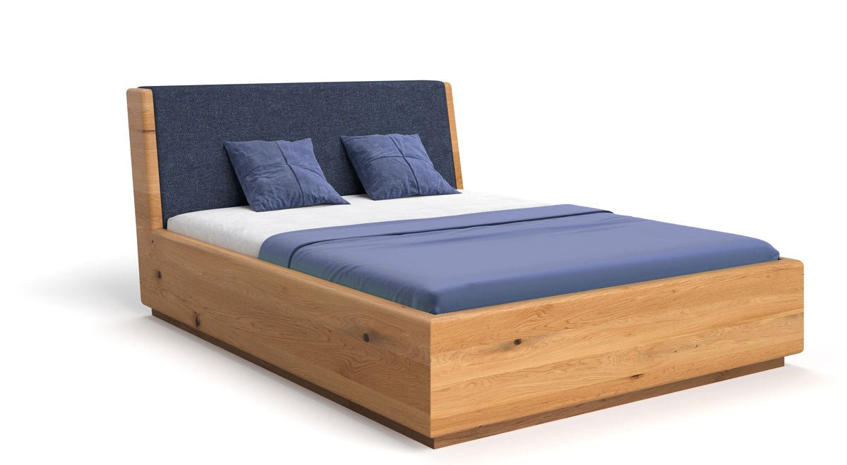 Designer wooden bed Cassian made of solid oak with storage space
