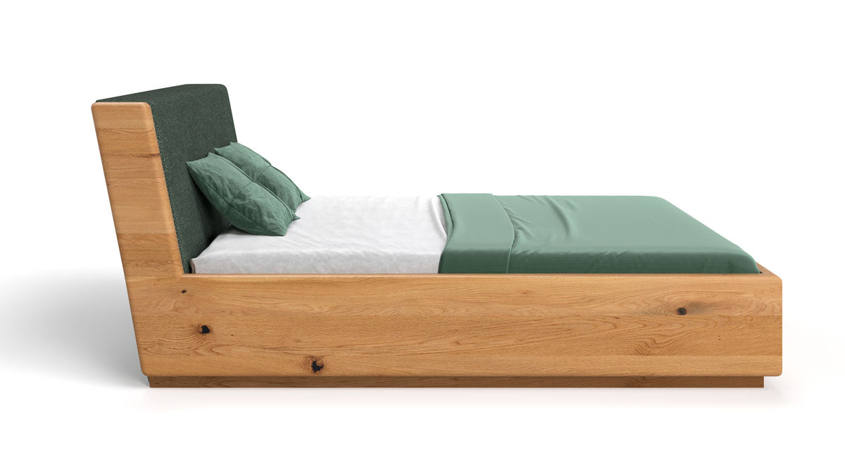 Designer wooden bed Cassian made of solid oak with storage space