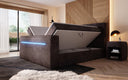 Boxspringbett Sejour mit TV Lift, RGB und Stauraum in Cord