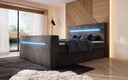 Boxspringbett Sejour mit TV Lift, RGB und Stauraum in Cord