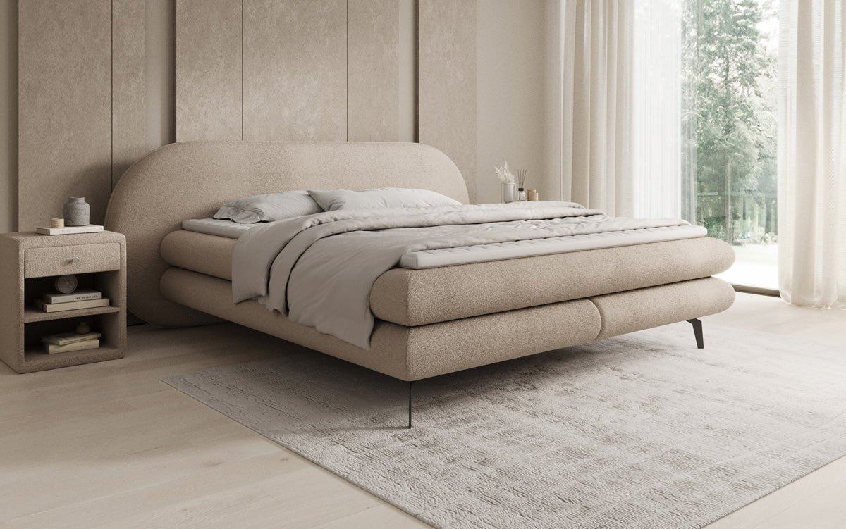 Box spring bed Marisol with oval headboard in bouclé