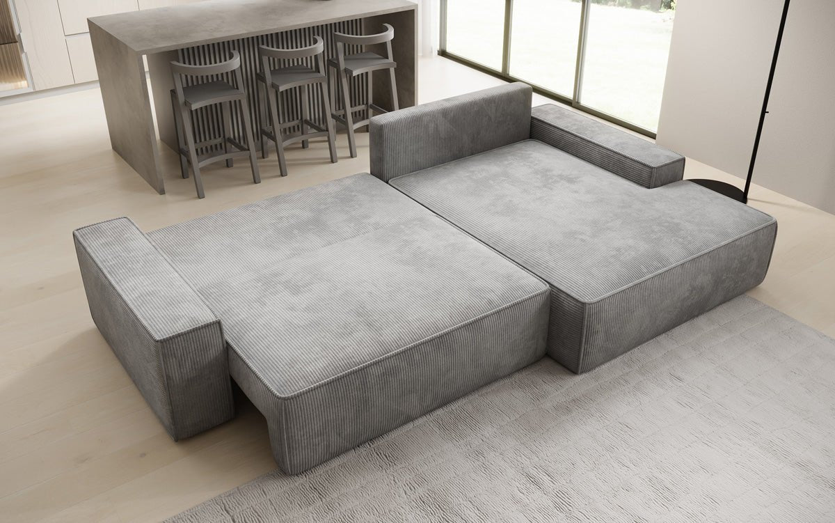 Designer Sofa Verona with wide ottoman, sleeper and folding function in Corduroy