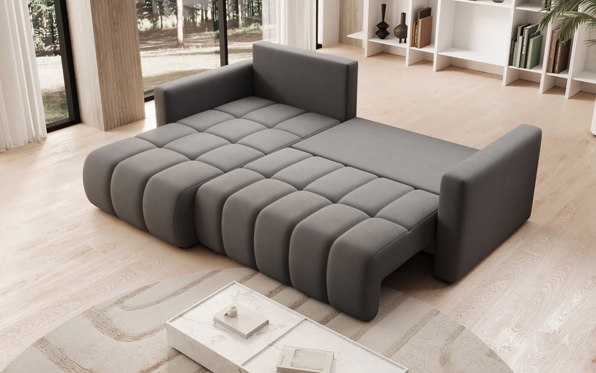 Designer sofa Beatrice L with sleeping and folding function in fabric