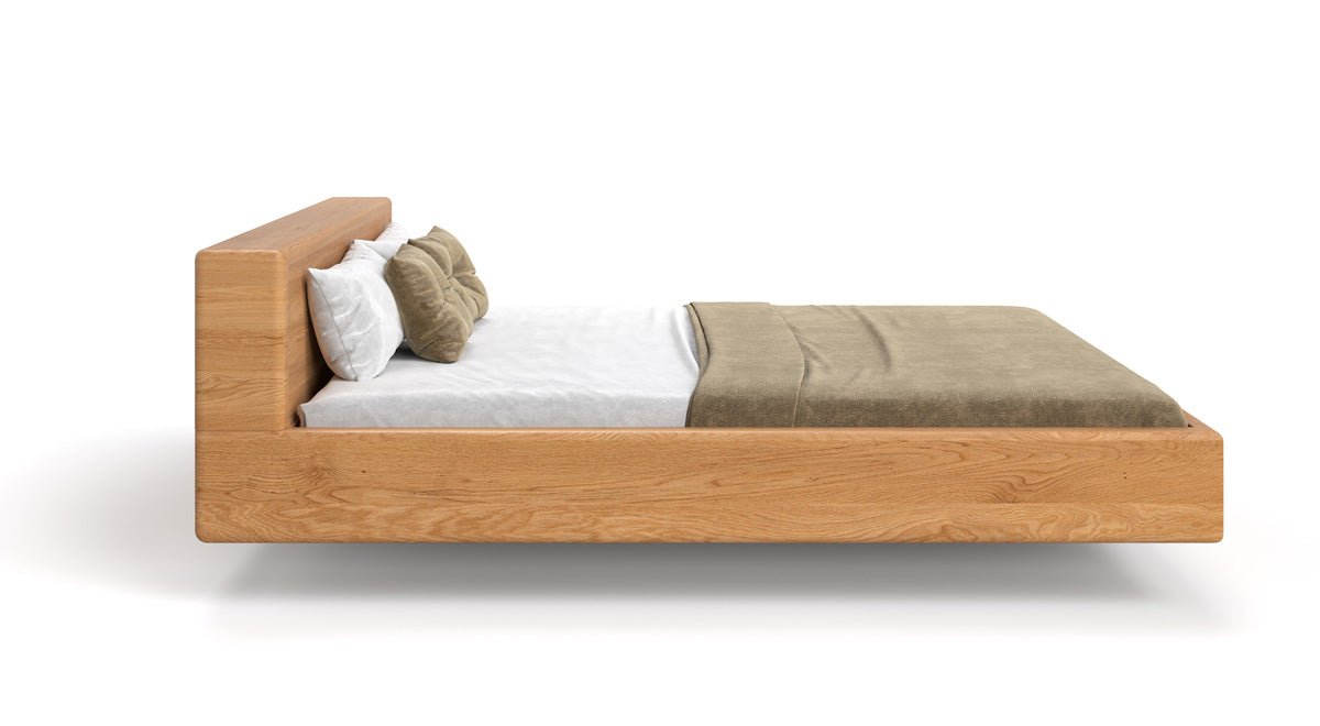 Designer wooden bed Arvelo made of solid Oak with floating appearance and straight headboard