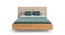 Designer wooden bed Valent made of solid oak in a floating appearance