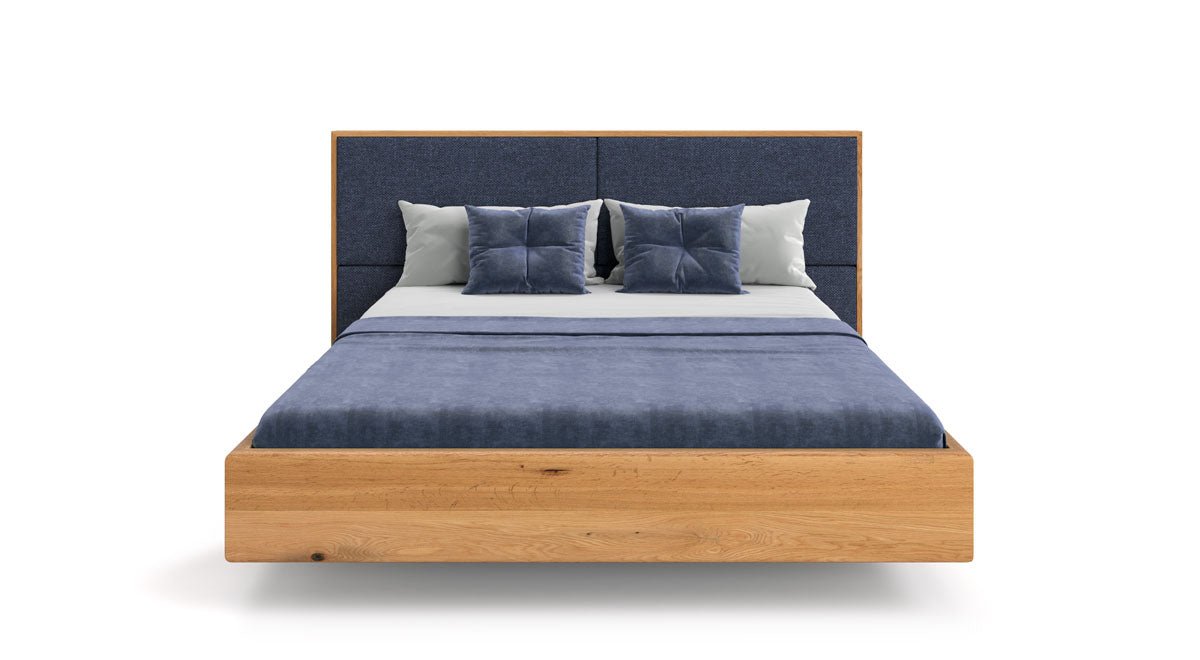 Designer wooden bed Valent made of solid oak in a floating appearance