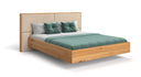 Designer wooden bed Valent made of solid oak in a floating appearance
