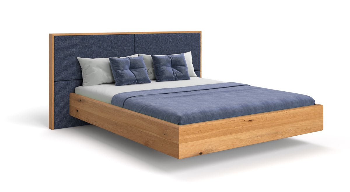 Designer wooden bed Valent made of solid oak in a floating appearance