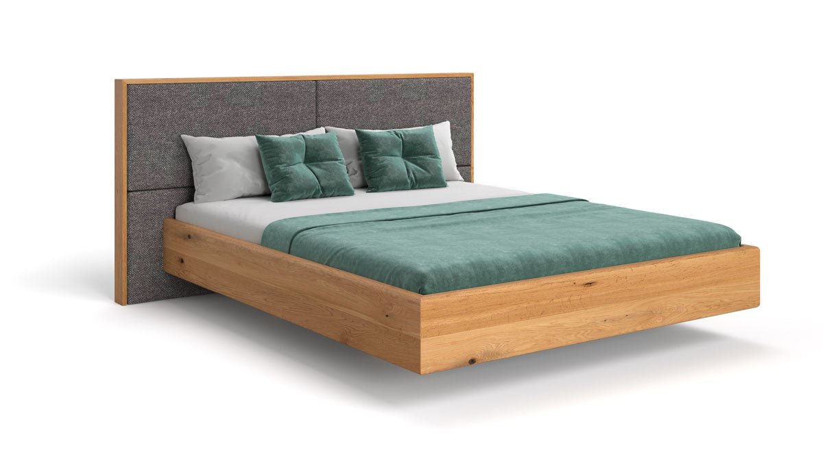 Designer wooden bed Valent made of solid oak in a floating appearance