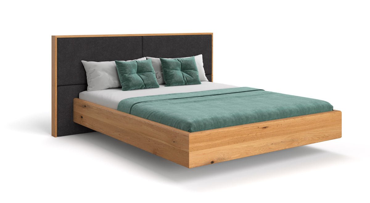 Designer wooden bed Valent made of solid oak in a floating appearance
