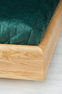 Designer wooden bed Valent made of solid oak with storage space