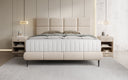 Nessa box spring bed with high legs in teddy bouclé