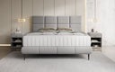 Nessa box spring bed with high legs in teddy bouclé