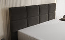Nessa box spring bed with high legs in teddy bouclé