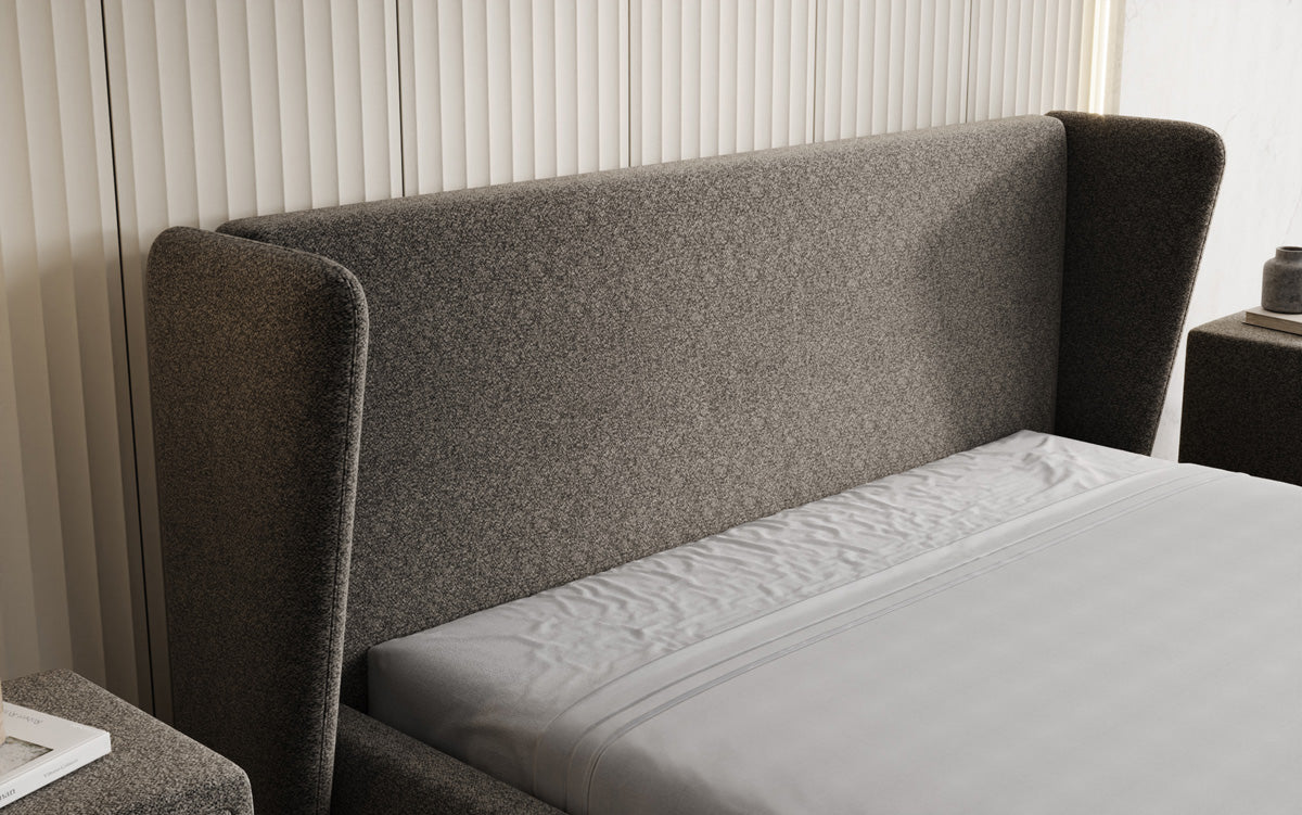 Designer upholstered bed Rosalie in textured fabric with storage