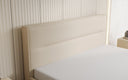 Designer upholstered bed Merry in fabric with storage