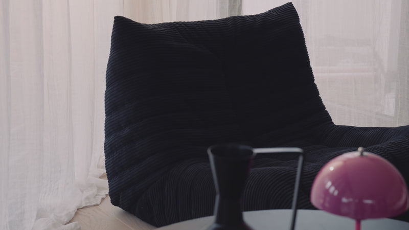 Designer sofa armchair Calmo in Corduroy