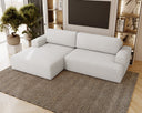 Designer corner sofa Siena bouclé with sofa bed function and storage space